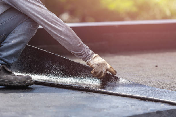 Professional Basement Waterproofing technician working in Hemlock, NY